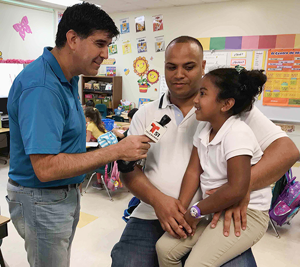 Luis Carrera, Telmundo 51, interviews Neighborhood Dad & daughter